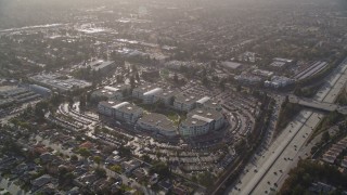 AXSF12_037 - 5K aerial stock footage of orbiting Apple Headquarters office buildings, Cupertino, California
