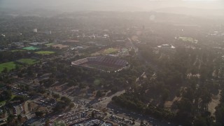 AXSF12_042 - 5K aerial stock footage reverse view of Stanford Stadium, pan across campus of Stanford University, Stanford, California