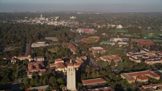 AXSF12_055 - 5K aerial stock footage tilt and fly over Stanford University, reveal Hoover Tower, stadiums and fields, Stanford, California