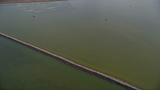 AXSF12_075 - 5K aerial stock footage of a reverse view of wetlands in Union City, California