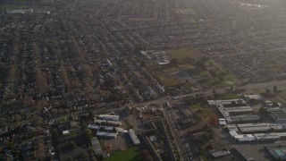 AXSF12_084 - 5K aerial stock footage of a reverse view of suburban homes, San Lorenzo, California