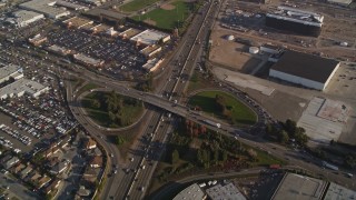 AXSF12_087 - 5K aerial stock footage of a reverse view of the I-880 freeway, San Leandro, California