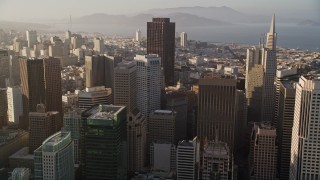 AXSF13_011 - 5K aerial stock footage of approaching skyscrapers and tilting to a group of them in Downtown San Francisco, California