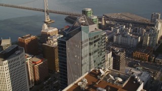AXSF13_012 - 5K aerial stock footage of orbiting Millennium Tower skyscraper in Downtown San Francisco, California