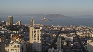 AXSF13_018 - 5K aerial stock footage flyby Russian Hill apartment buildings with Alcatraz in distance, San Francisco, California