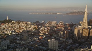 AXSF13_044 - 5K aerial stock footage pan from Coit Tower and Treasure Island to Transamerica Pyramid in Downtown San Francisco, California