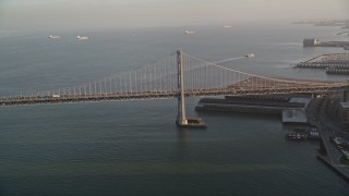 AXSF13_047 - 5K aerial stock footage of approaching the Bay Bridge in San Francisco, California