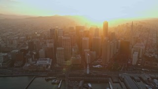 AXSF14_011 - 5K aerial stock footage downtown skyscrapers and the Ferry Building, San Francisco, California, sunset
