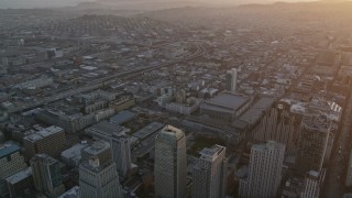 AXSF14_016 - 5K aerial stock footage pan from South of Market to San Francisco Marriott Marquis hotel, Downtown San Francisco, sunset