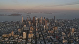 AXSF14_019 - 5K aerial stock footage reverse view of Downtown San Francisco and San Francisco Bay, California, twilight