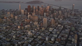AXSF14_023 - 5K aerial stock footage tilt from Civic Center to reveal Downtown San Francisco, California, twilight