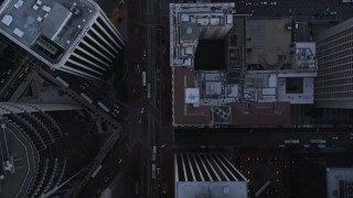 AXSF14_028 - 5K aerial stock footage of a bird's eye view of city streets in Downtown San Francisco, California, sunset