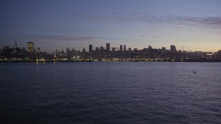 AXSF14_091 - 5K aerial stock footage of Russian Hill, Coit Tower and Fisherman's Wharf, San Francisco, California, twilight