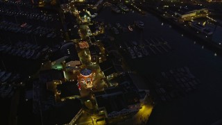 AXSF14_092 - 5K aerial stock footage approach and fly over Pier 39 from the San Francisco Bay, San Francisco, California, night