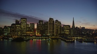 AXSF14_098 - 5K aerial stock footage Ferry Building and the skyline of Downtown San Francisco, California, twilight