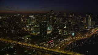 AXSF14_129 - 5K aerial stock footage of Downtown San Francisco seen from the Bay Bridge, California, night