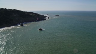 AXSF15_028 - 5K aerial stock footage of tilting from San Francisco Bay, reveal Seal Rocks rock formations, San Francisco, California
