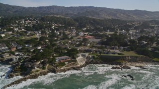AXSF15_048 - 5K aerial stock footage video of flying by coastal neighborhoods in Moss Beach, California