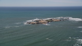 AXSF15_075 - 5K aerial stock footage of flying by Año Nuevo Island off the coast of California