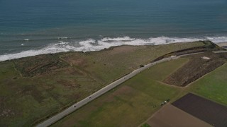 AXSF15_081 - 5K aerial stock footage of the Highway 1 coastal road in Davenport, California