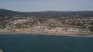 AXSF15_098 - 5K aerial stock footage of flying by the Santa Cruz Beach Boardwalk, Santa Cruz, California