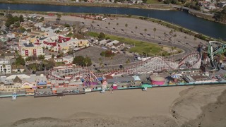 AXSF15_101 - 5K aerial stock footage of a roller coaster at the Santa Cruz Beach Boardwalk, Santa Cruz, California
