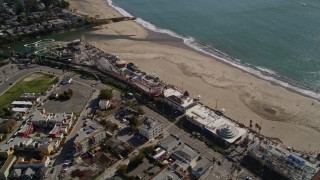 AXSF15_103 - 5K aerial stock footage of flying by the beach and rides at Santa Cruz Beach Boardwalk, Santa Cruz, California