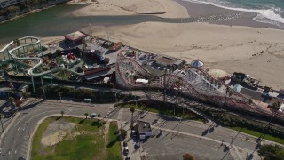 AXSF15_104 - 5K aerial stock footage of passing a roller coaster at Santa Cruz Beach Boardwalk, Santa Cruz, California