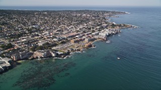 AXSF16_007 - 5K aerial stock footage tilt to reveal coastal neighborhoods and Monterey Bay Aquarium, Monterey, California