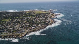 AXSF16_012 - 5K aerial stock footage tilt to reveal kelp forests and coastal residential neighborhoods, Monterey, California