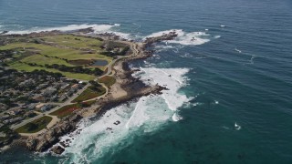 AXSF16_013 - 5K aerial stock footage tilt from kelp forests to reveal Point Pinos Lighthouse Reservation, Monterey, California
