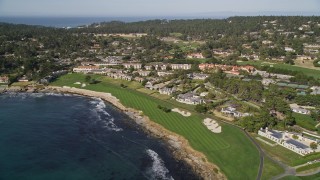 AXSF16_030 - 5K aerial stock footage flyby Pebble Beach Resorts hotel and Pebble Beach Golf Links, Pebble Beach, California