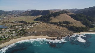 AXSF16_039 - 5K aerial stock footage tilt from Carmel Bay revealing Carmel State Beach and homes, Carmel, California