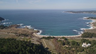 AXSF16_042 - 5K aerial stock footage approach Carmel Bay and beach by Highway 1 by Carmelite Monastery, Carmel, California