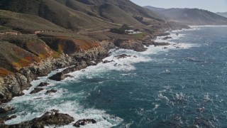 AXSF16_058 - 5K aerial stock footage tilt from the Pacific Ocean to reveal coastline, Carmel, California