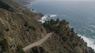 AXSF16_116 - 5K aerial stock footage of following Highway 1 atop coastal cliffs, Big Sur, California