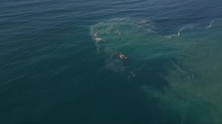 AXSF16_127 - 5K aerial stock footage reverse view of the calm waters of the Pacific Ocean
