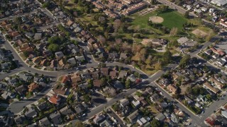 AXSF16_156 - 5K aerial stock footage reverse view of suburban neighborhoods, reveal Meadow Park, San Luis Obispo, California