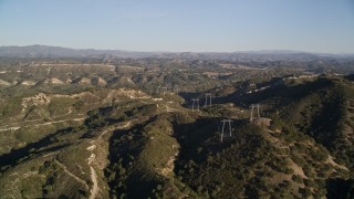 AXSF17_003 - 5K aerial stock footage approach power lines atop hills, San Luis Obispo County, California