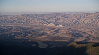 AXSF17_024 - 5K aerial stock footage of flying by Cuyama Valley and Caliente Mountain Range, San Luis Obispo, California