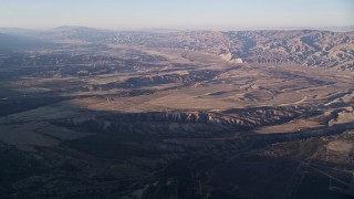 AXSF17_025 - 5K aerial stock footage of a wide view of Cuyama Valley and Caliente Mountain Range, San Luis Obispo, California