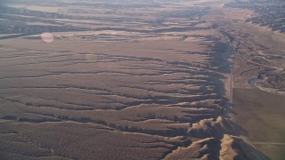 AXSF17_029 - 5K aerial stock footage of a view of cracks in the desert, Cuyama Valley, California