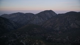 AXSF17_060 - 5K aerial stock footage of flying by mountains, Los Padres National Forest, California, twilight