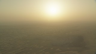 CAP_001_003 - HD stock footage aerial video of the sunrise above sand dunes, Al Selmiyyah, Abu Dhabi, UAE