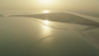CAP_001_004 - HD stock footage aerial video of a desert island at sunrise in Al Selmiyyah, Abu Dhabi, UAE