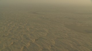 CAP_001_005 - HD stock footage aerial video of tilting to desert sand dunes in Al Selmiyyah, Abu Dhabi, UAE