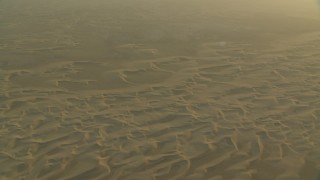 CAP_001_009 - HD stock footage aerial video of sand dunes at sunrise in Al Gharbia, Abu Dhabi, UAE