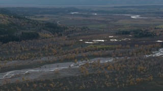 CAP_002_003 - HD stock footage aerial video of a river and autumn trees in Jackson Hole, Wyoming, twilight
