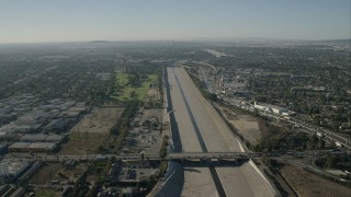 CAP_003_003 - HD stock footage aerial video of following the LA River past Lynwood, California