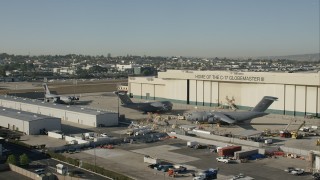 CAP_003_007 - HD stock footage aerial video orbit military planes at Long Beach Airport, California
